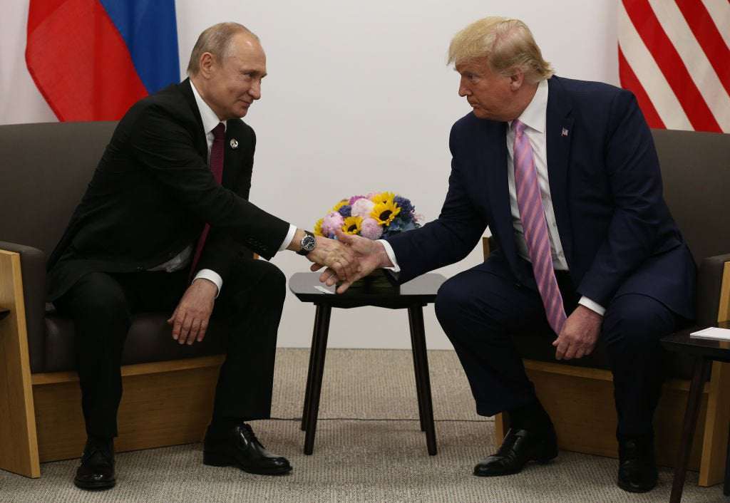 image for Trump Wanted to 'Stay in Power Forever' Like Putin, Says His Ex-National Security Adviser