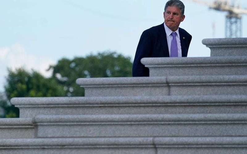 image for Manchin, who pockets $500,000 per year from dirty coal, kills critical Biden climate deal
