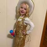 image for My daughter dressed as her hero, Dolly Parton.