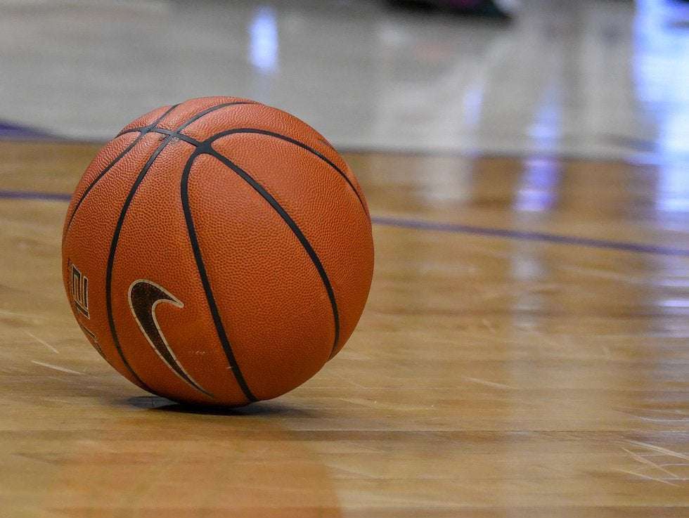 image for Woman reaches into purse, accidentally fires gun at Madison basketball game