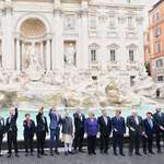 image for World leaders tossing a coin at the Trevi fountain in Rome for good luck fighting the climate crisis