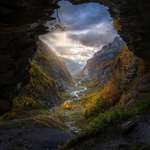 image for I hiked in the French Alps last week and took this picture of a cave overlooking a beautiful valley