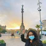 image for My wife, who is Native American, giving the finger to a statue of Christopher Columbus in Barcelona.