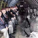 image for D-day vets sitting across their younger selves in the same plane before dropping into Normandy 1944.