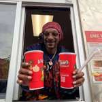 image for Snoop Dogg working the window at the Raising Canes in Fayateville AR yesterday