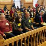 image for Anti-vaxxers showing up to municipal meetings wearing yellow stars, Kansas