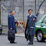 image for Japanese businessmen with their longbows