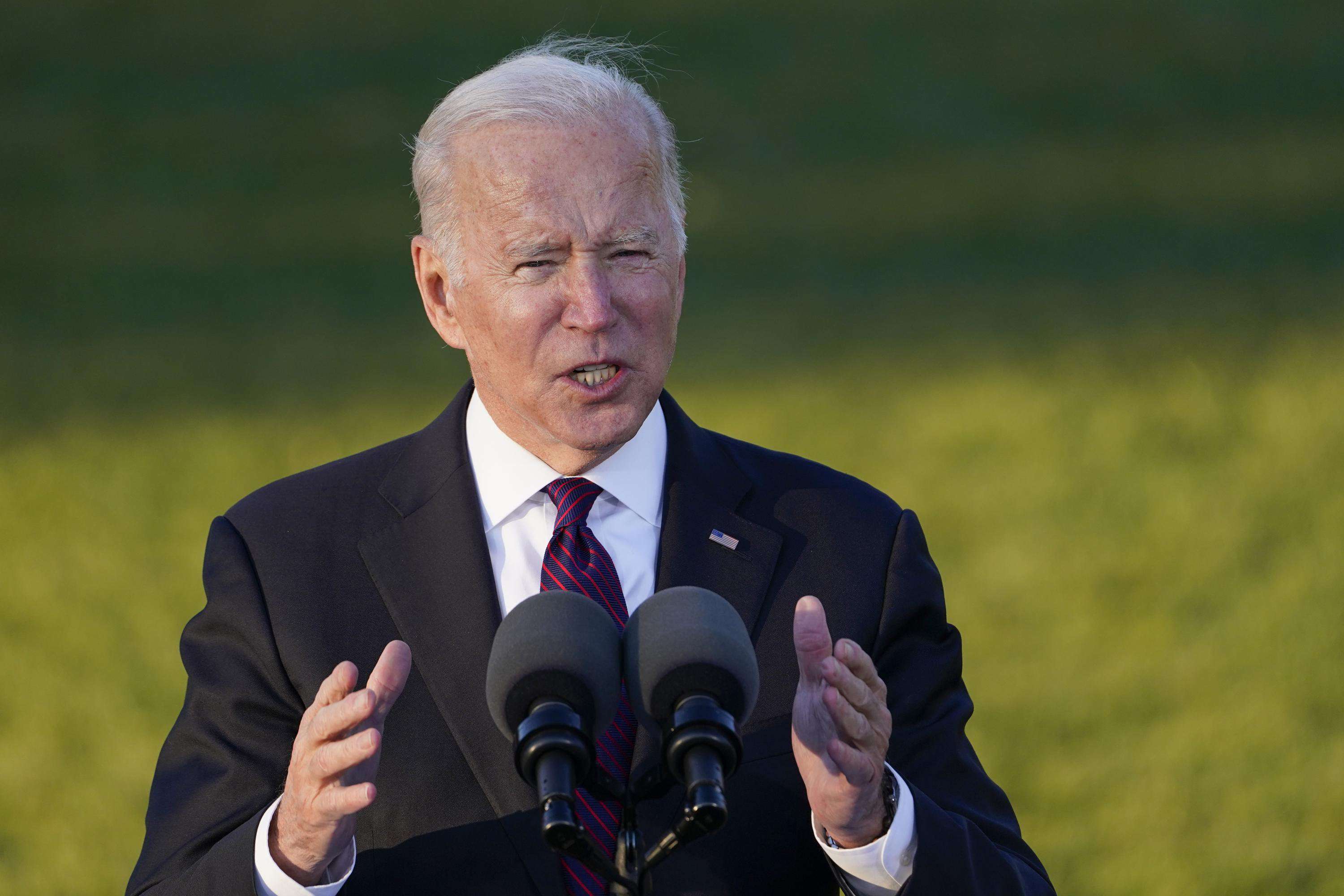 image for Biden signs $1T infrastructure deal with bipartisan crowd
