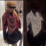 image for Paris Hilton Wearing An Anti-Paparazzi Scarf That Ruins Photos By Affecting Flash Photography.