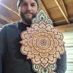 image for Mandala I carved, painted and stained recently.