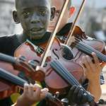 image for Diego Turkato playing the violin at the funeral of his teacher who rescued him from poverty & crime