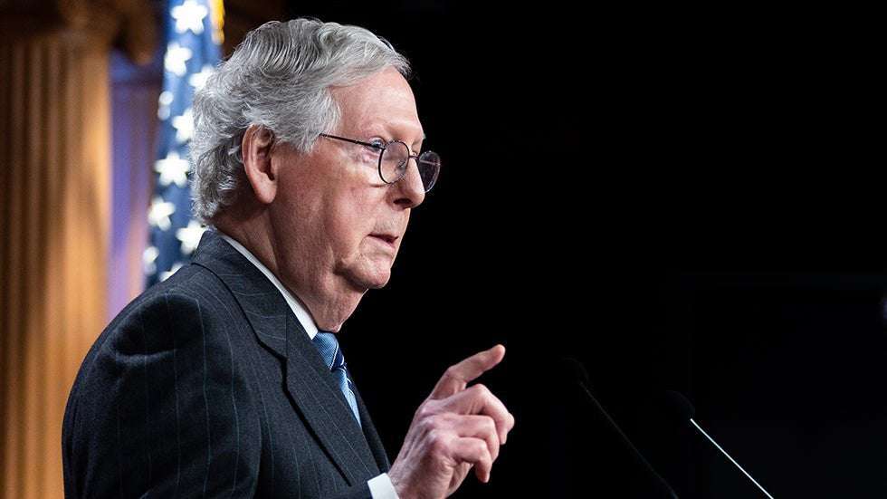image for McConnell says he thinks Manchin 'would be more comfortable' in GOP