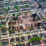 image for West Philadelphia neighborhood after being bombed by city police in 1985 as seen from above