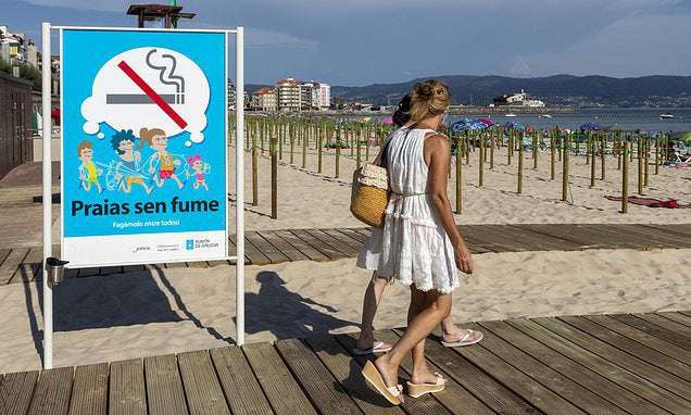 image for Spain will ban smoking on ALL beaches and fine anyone caught lighting up £1,700