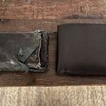 image for My wife gave me both wallets. One on left, 15 years ago. One on right, yesterday.