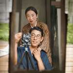 image for A Japanese couple taking a self portrait together in 1920.