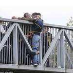 image for Strangers held on to a suicidal man at the edge of a bridge for two hours.