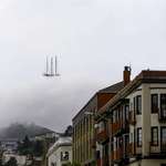 image for Sutro Tower in San Francisco that looks like a pirate ship as some of it peeks through the clouds.