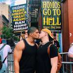 image for Pro wrestler kisses his boyfriend in front of homophobic protestors to “stand up against hate”.