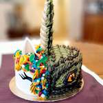 image for Friend: "Can you make some kind of unicorn and dinosaur cake?" Me: "Hold my coffee, I got this!"