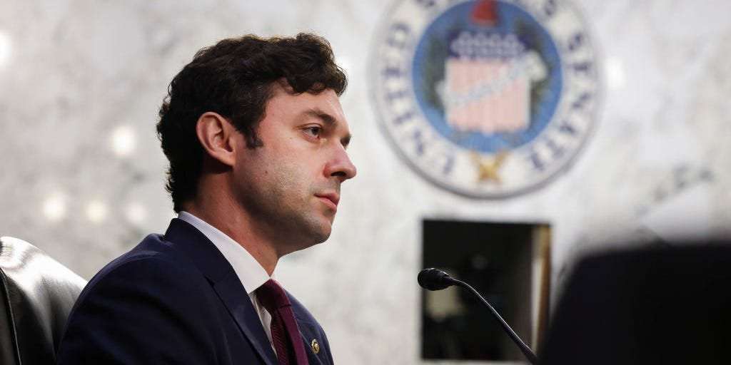image for Sen. Jon Ossoff set to introduce bill barring members of Congress from trading individual stocks: report