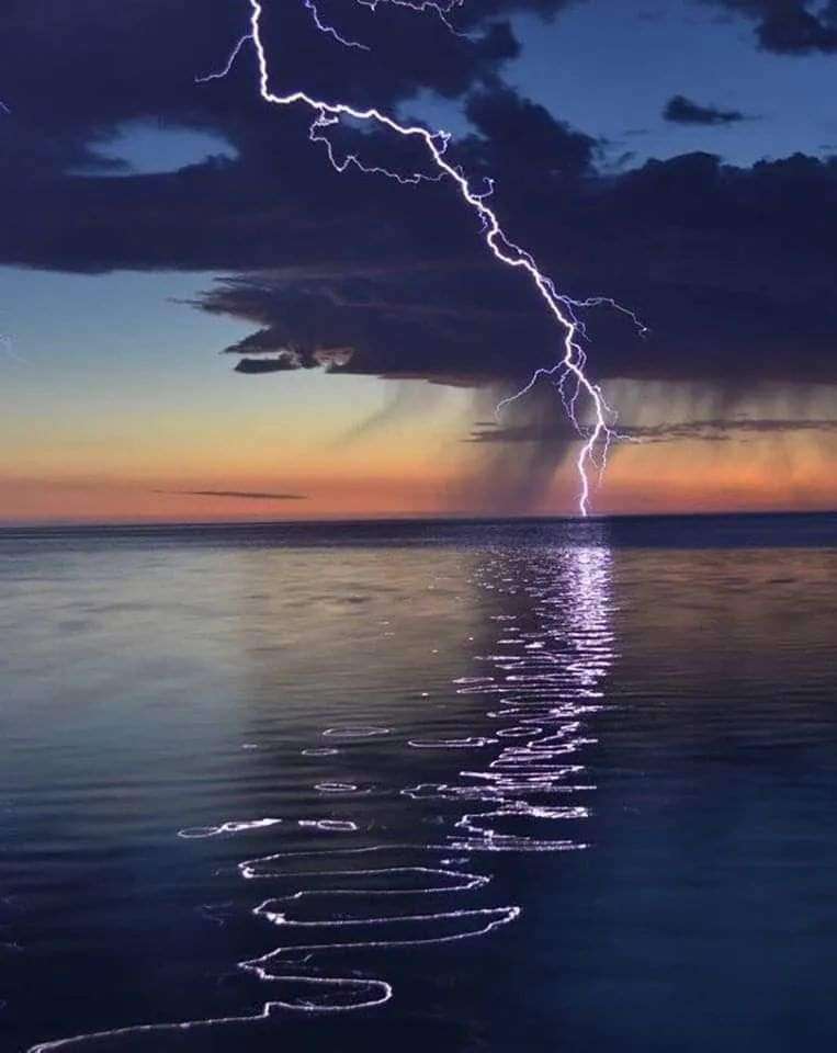 image showing Lightning reflection on ocean