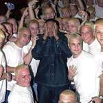 image for Dr. Dre surrounded by Eminem clones on the set of “The Real Slim Shady” music video. (2000)