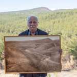 image for Hikmet Kaya, an engineer from Turkey, standing in front of a land which he afforrested for 41 years.