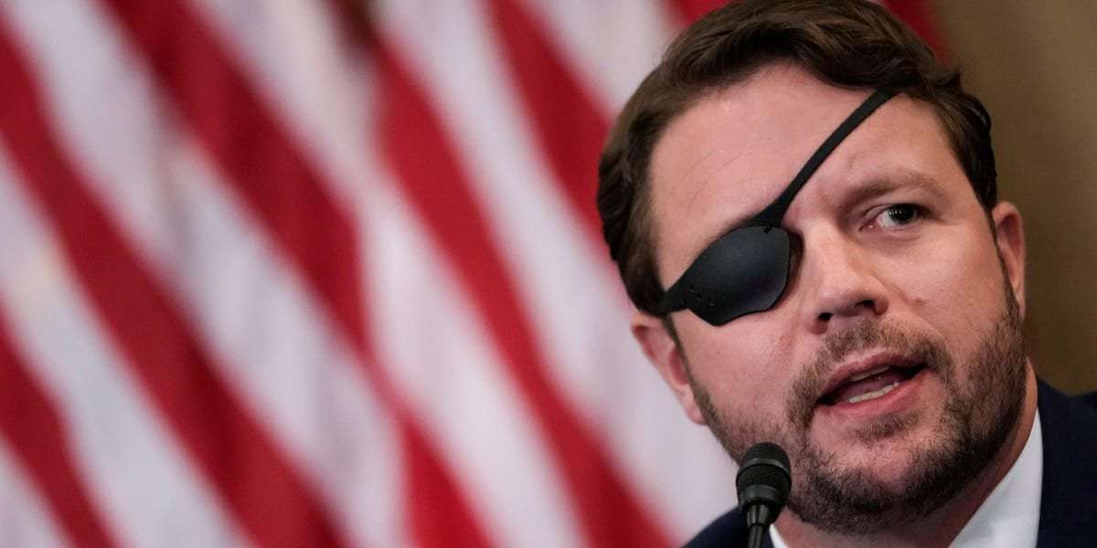 image for Rep. Dan Crenshaw of Texas invested in electric cars after bashing Democrats for being 'obsessed' with them