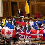 image for Ukrainian MPs holding up flags of countries that have offered help to Ukraine