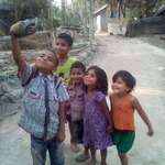 image for A group of children in a poor Asian country, Life is hard but childhood is stronger