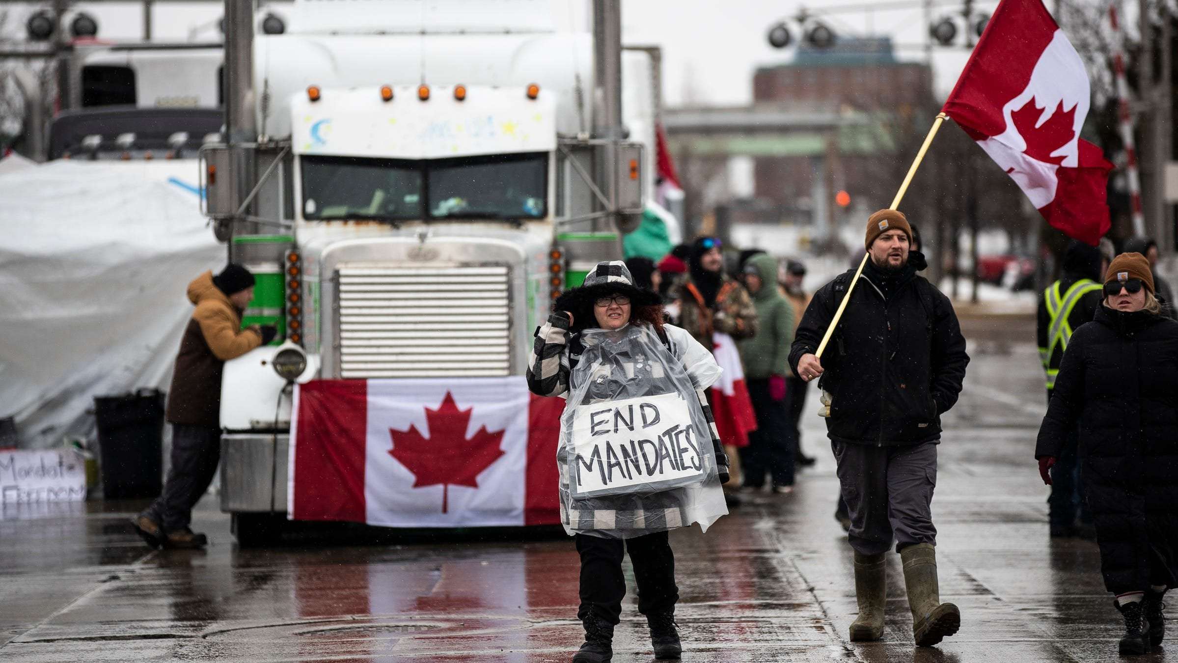image for Trucks are gone from Ambassador Bridge, but more protesters arrive on foot
