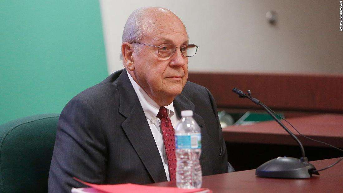 image for After 8 years, a retired Florida police captain will stand trial for killing a man in an argument about texting in a movie theater