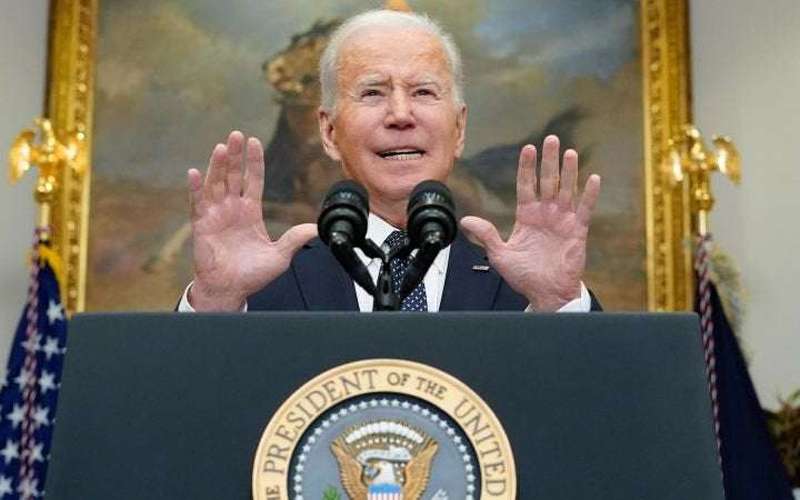 image for Biden says he's now convinced Putin has decided to invade Ukraine, but leaves door open for diplomacy