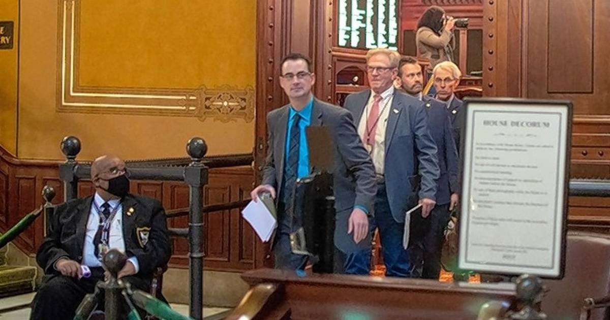 image for Democrats vote to remove 9 maskless Republicans from state House chamber