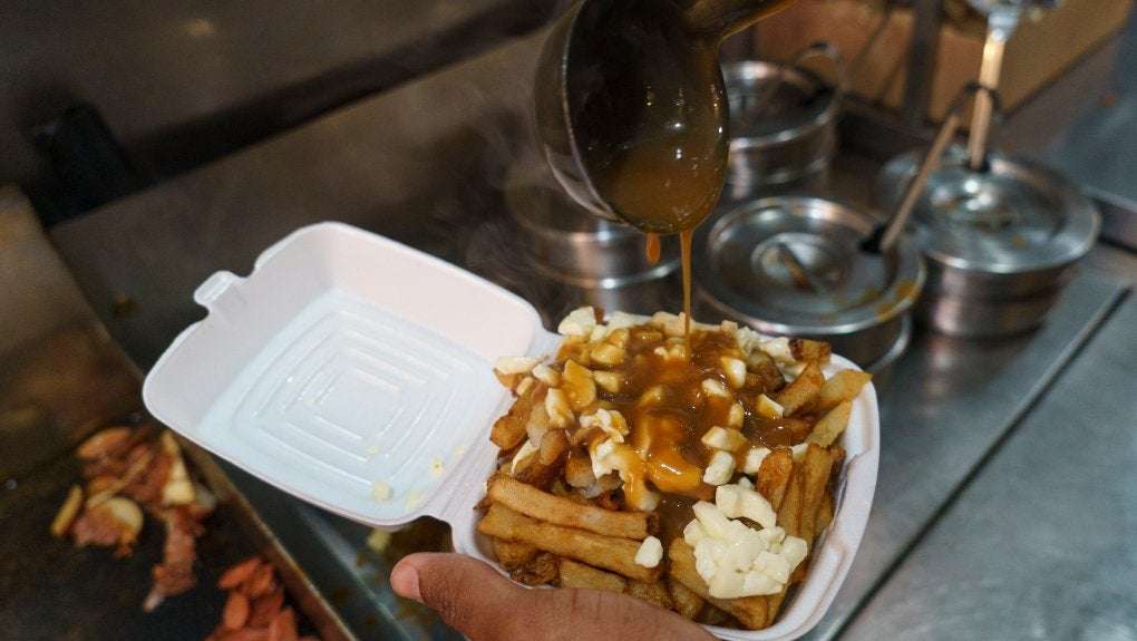 image for French poutinerie tells customers it's not linked to Russian president after threats