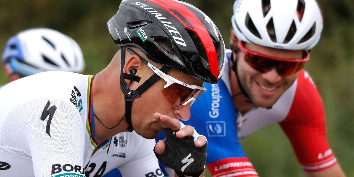 image for A world champion cyclist says racing has gotten so tough that riders have taken to peeing on each other during races