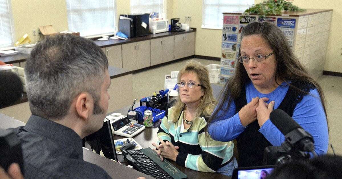 image for Federal judge sides with two same-sex couples, rules Kim Davis violated their constitutional rights