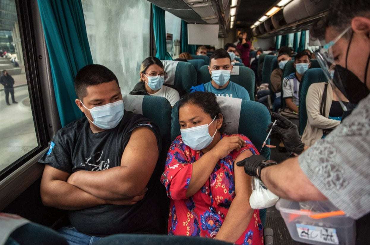 image for In Laredo, a bus brigade is vaccinating Mexican citizens with COVID-19 shots that Texans aren’t using