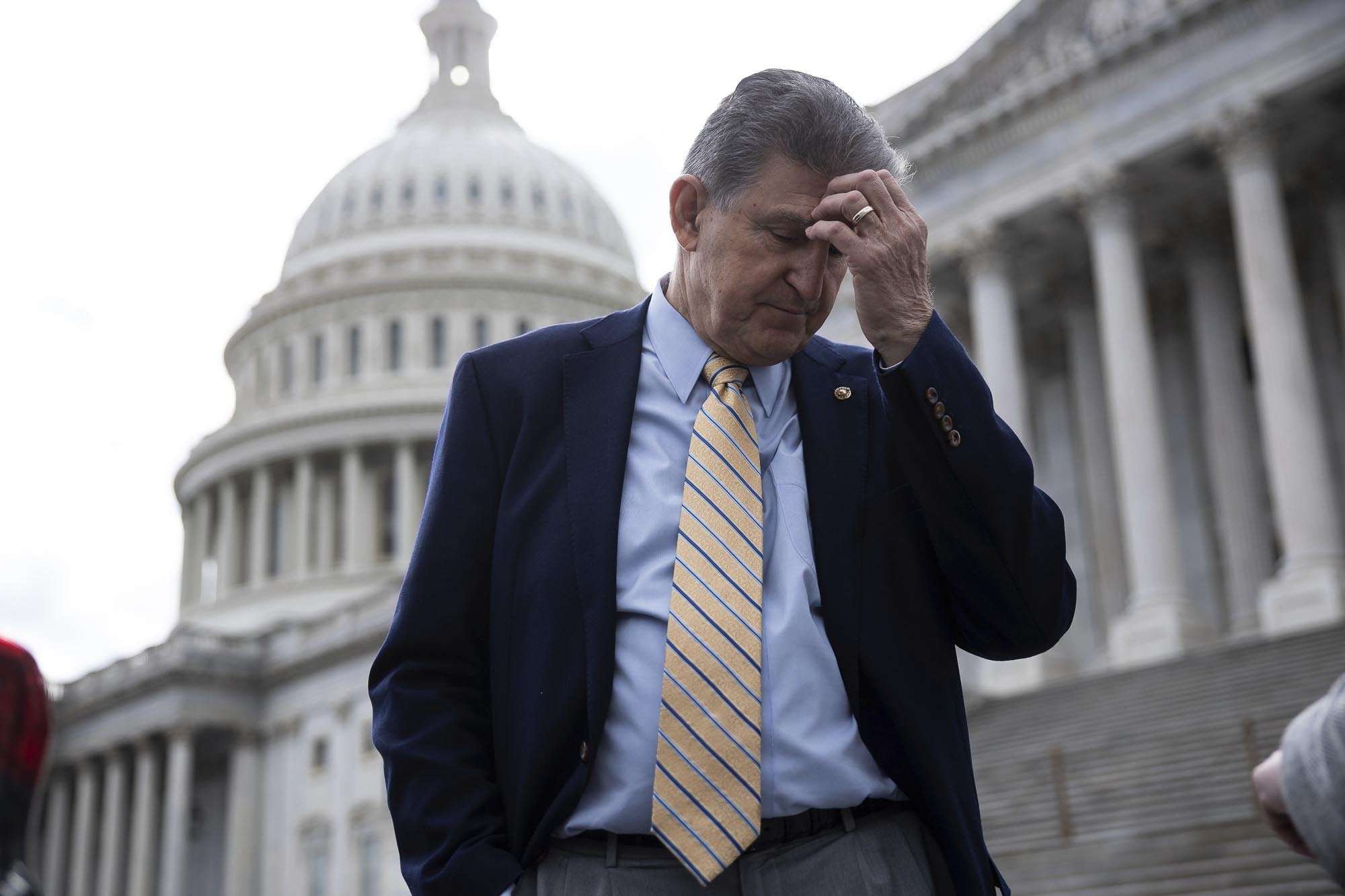 image for How Joe Manchin Knifed the Democrats — and Bailed on Saving Democracy
