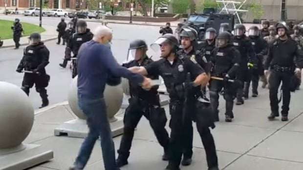 image for Buffalo, N.Y., police officers cleared of wrongdoing after shoving elderly man to ground at protest
