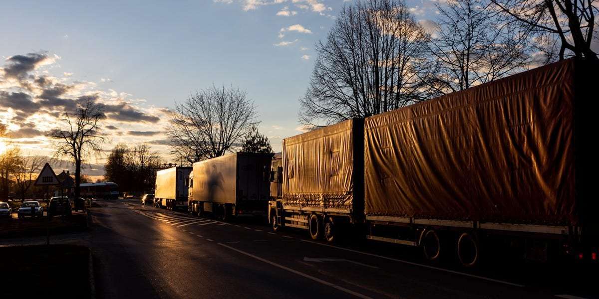 image for Russian and Belarusian trucks formed a 50-mile queue at the Polish border while trying to leave the EU ahead of a ban deadline