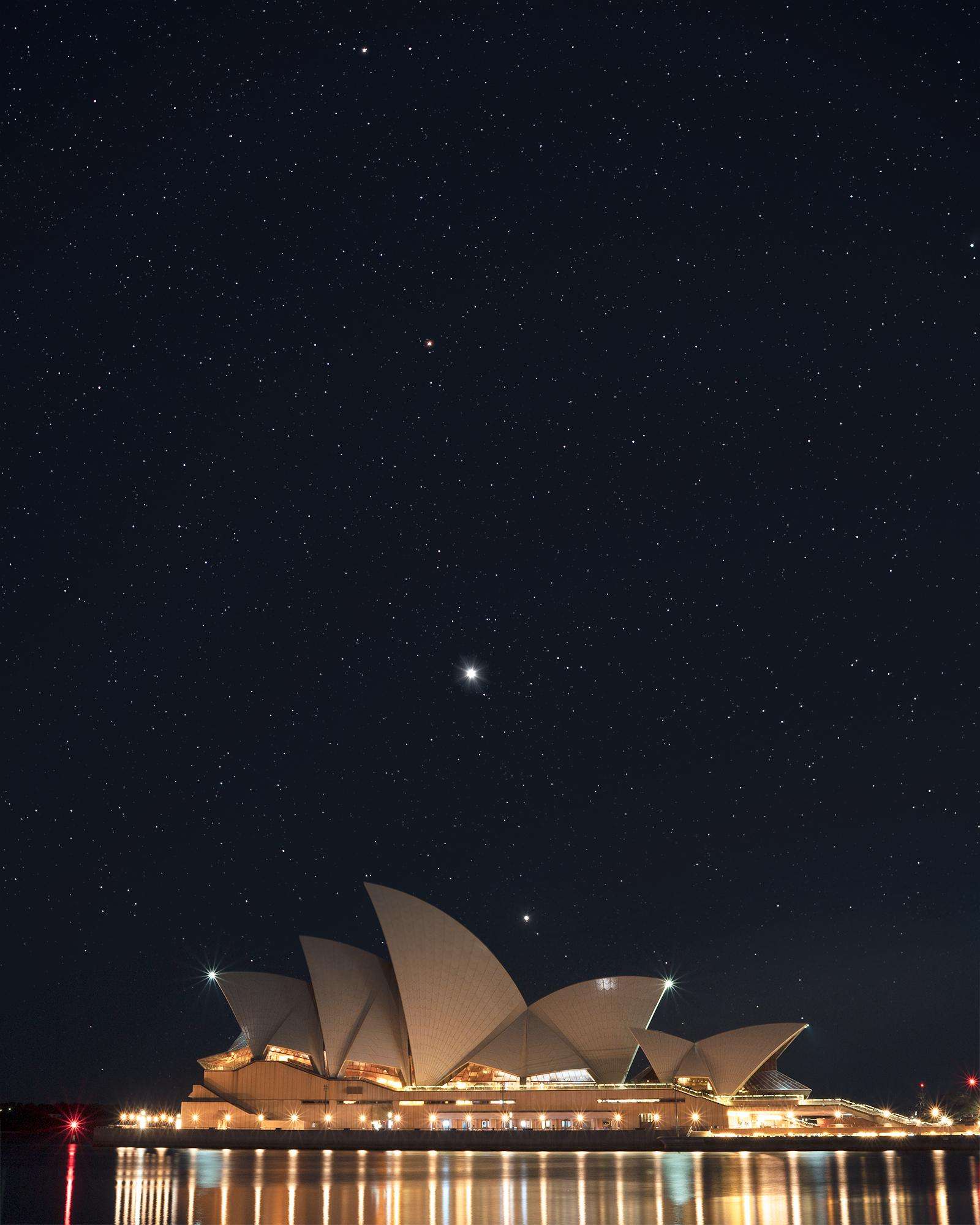 image showing [OC] I woke at 2am to photograph 5 planets perfectly aligned above the Sydney Opera House.