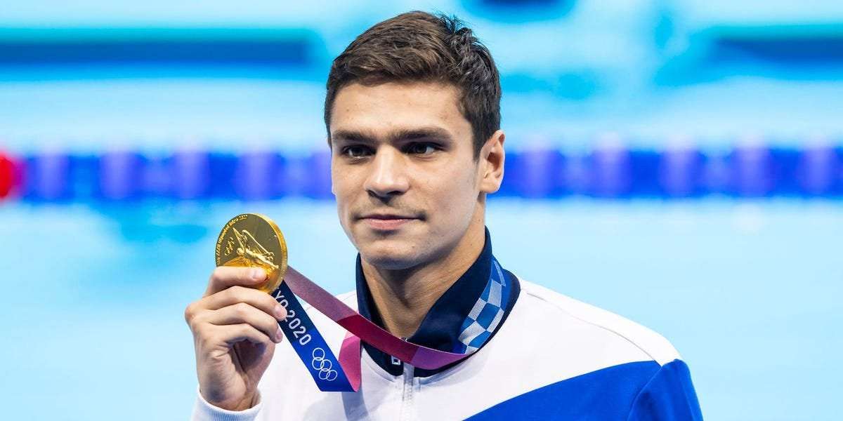 image for Russian Olympic winner who claimed to be swimming's biggest star is banned from the sport for attending pro-war rally