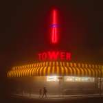 image for ITAP of an illuminated neon tower in the fog