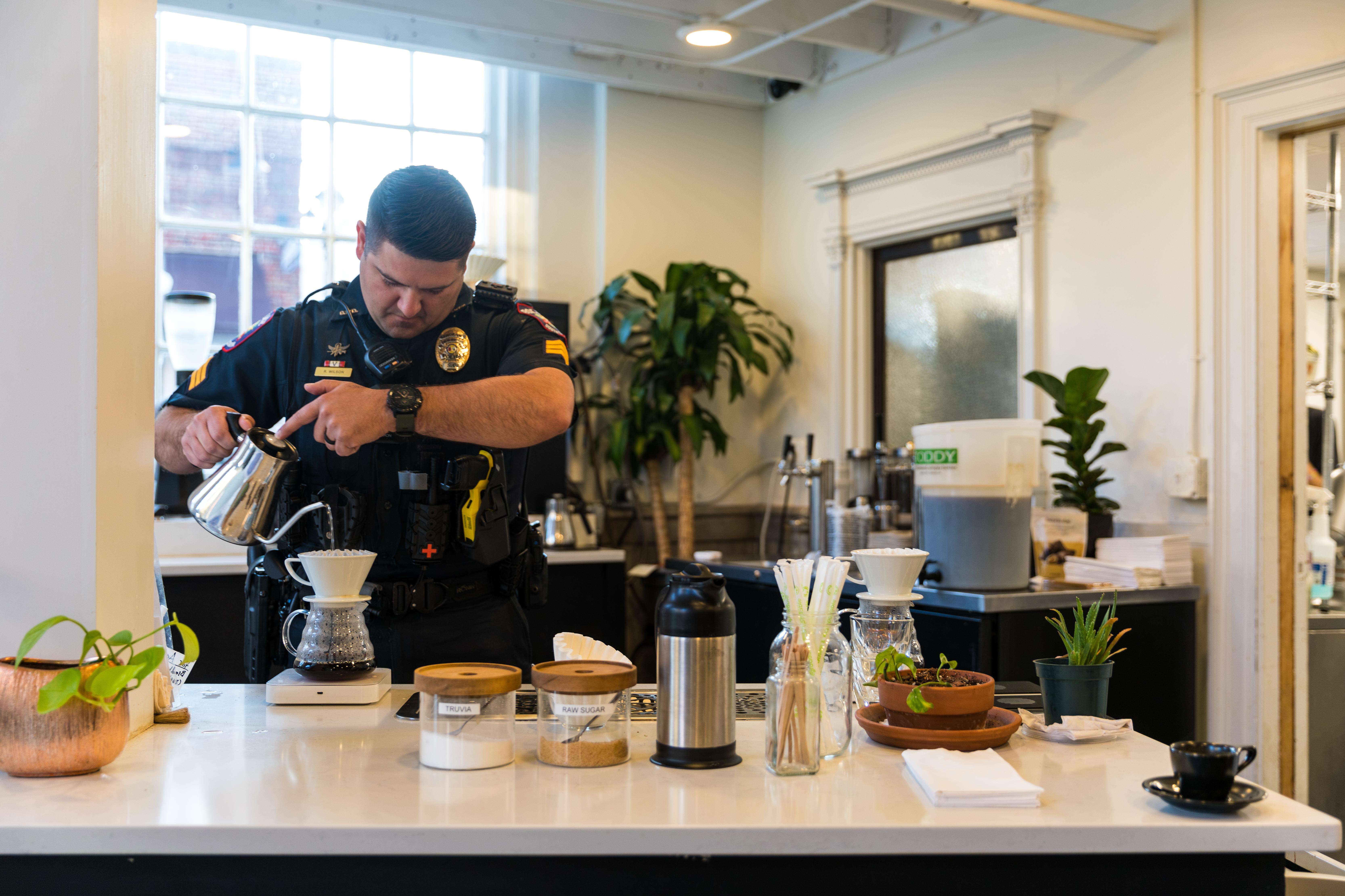 image showing ITAP of a Police Officer in Greer, South Carolina making me a coffee