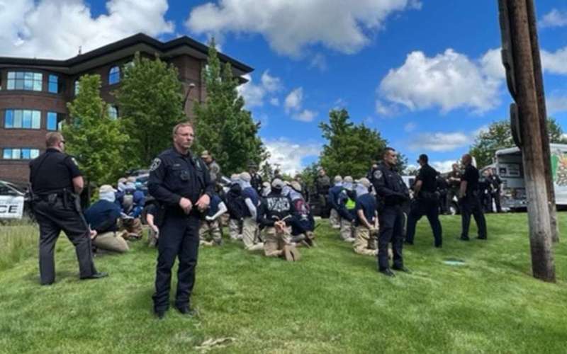 image for Idaho officers getting death threats after arresting 31 Patriot Front white nationalists near Pride event