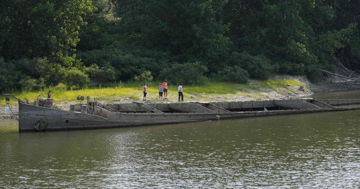 image for Italy's largest river dries up, exposing World War II barge that sank in 1943