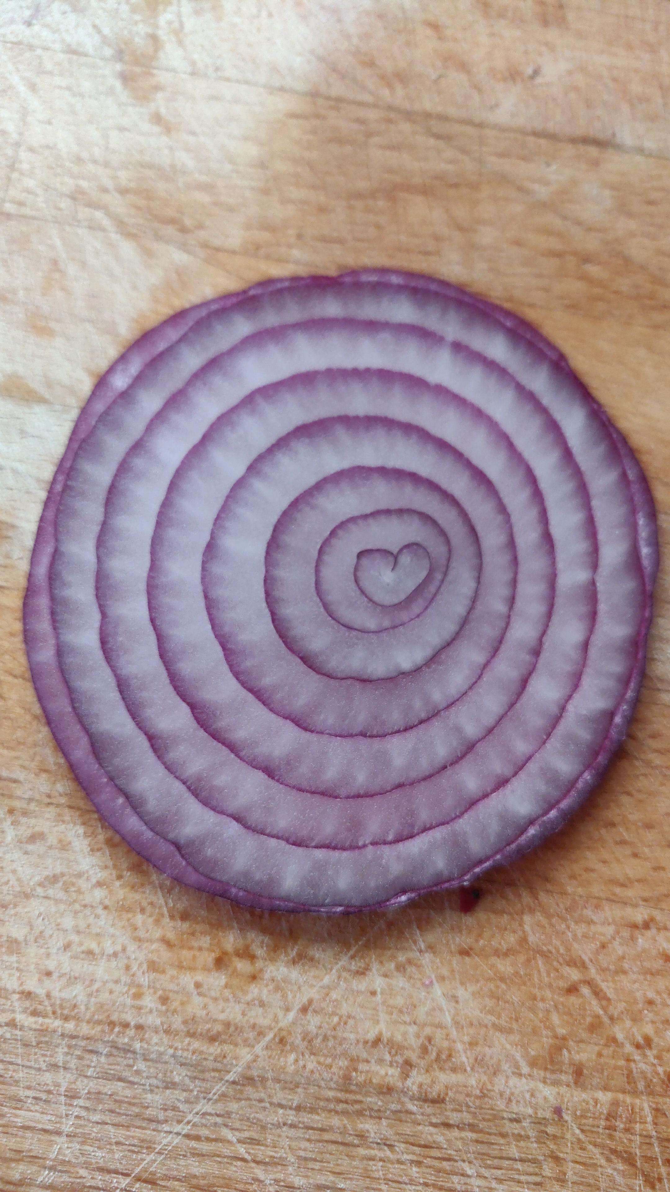image showing Found a little heart when cutting onions