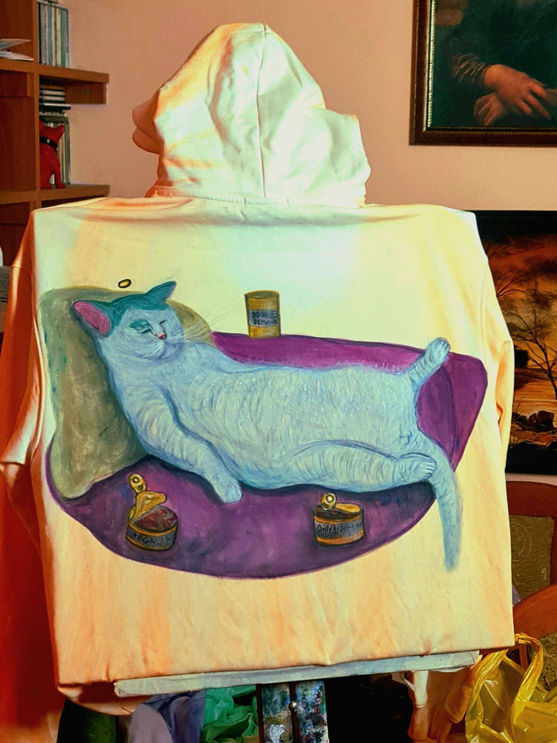 image showing I Painted My Cat In A Food Coma On A Hoodie [OC]
